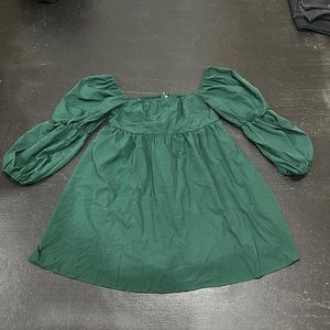 NEVER BEEN WORN. Brand new Exlura dress. Beautiful green.